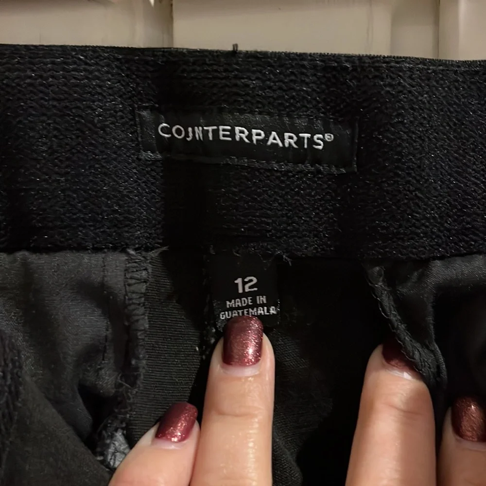 Size 12 black Capri pants. Worn several times Listing #4825 - Picture 4 of 5